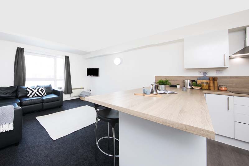 Seating area in a shared kitchen for en-suite rooms