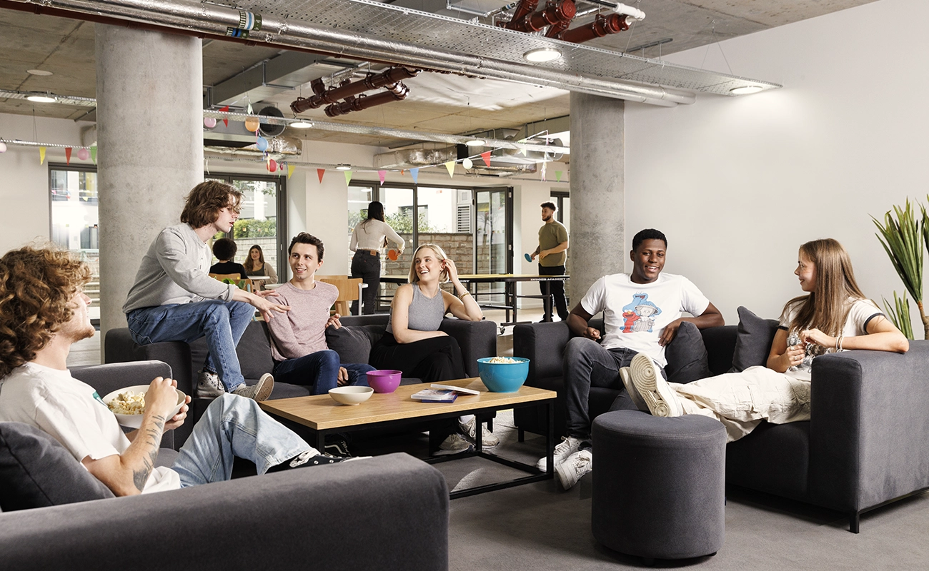 Students in the common room TV area