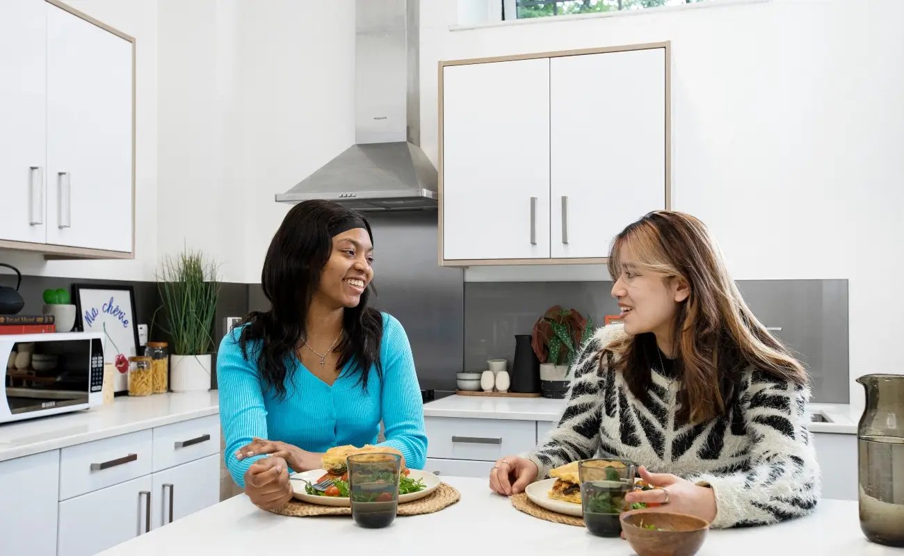 Students in a shared kitchen