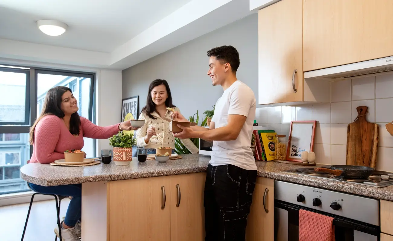 Students in a shared kitchen