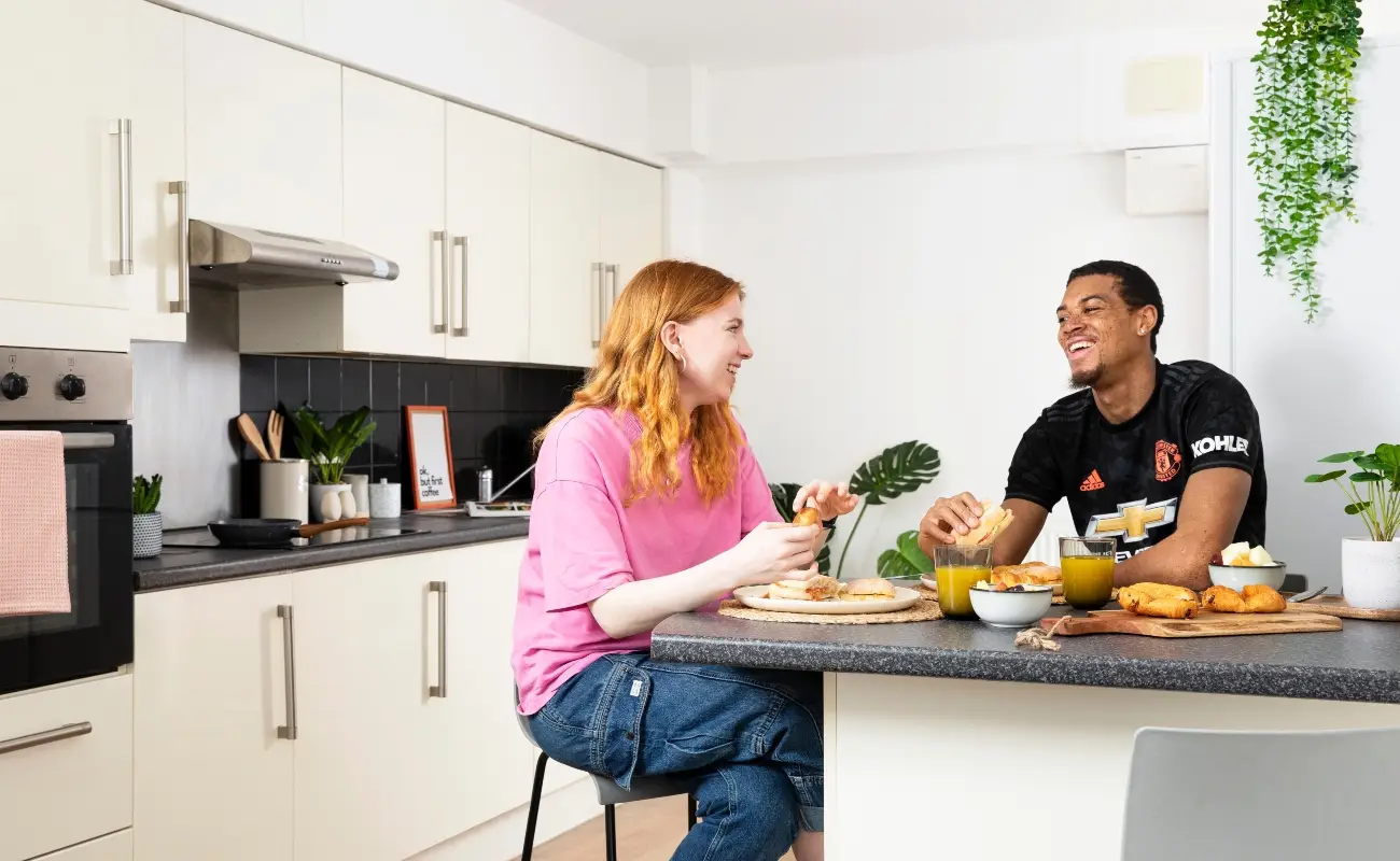 Students in a shared kitchen