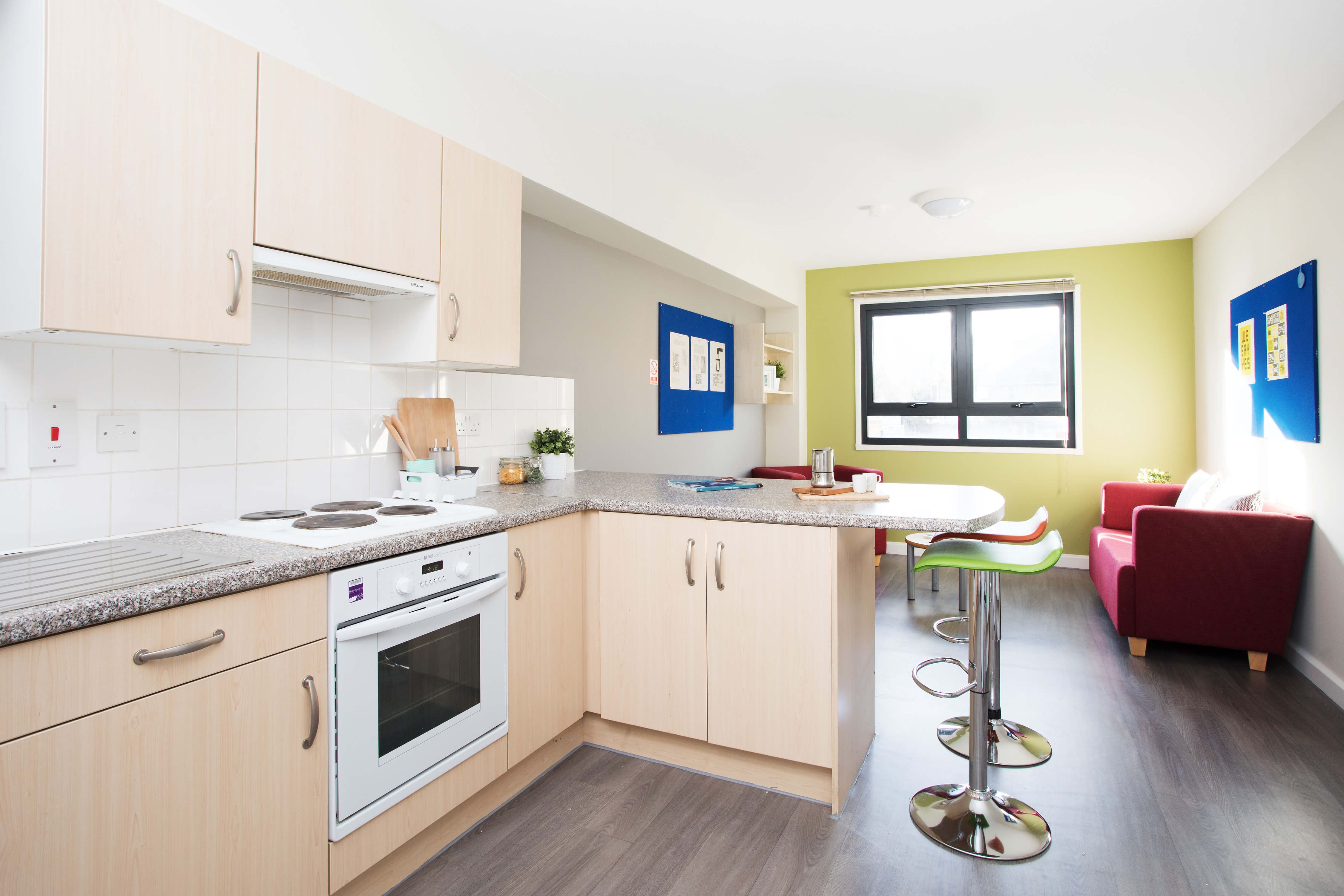 Kitchen with breakfast bar and sofa