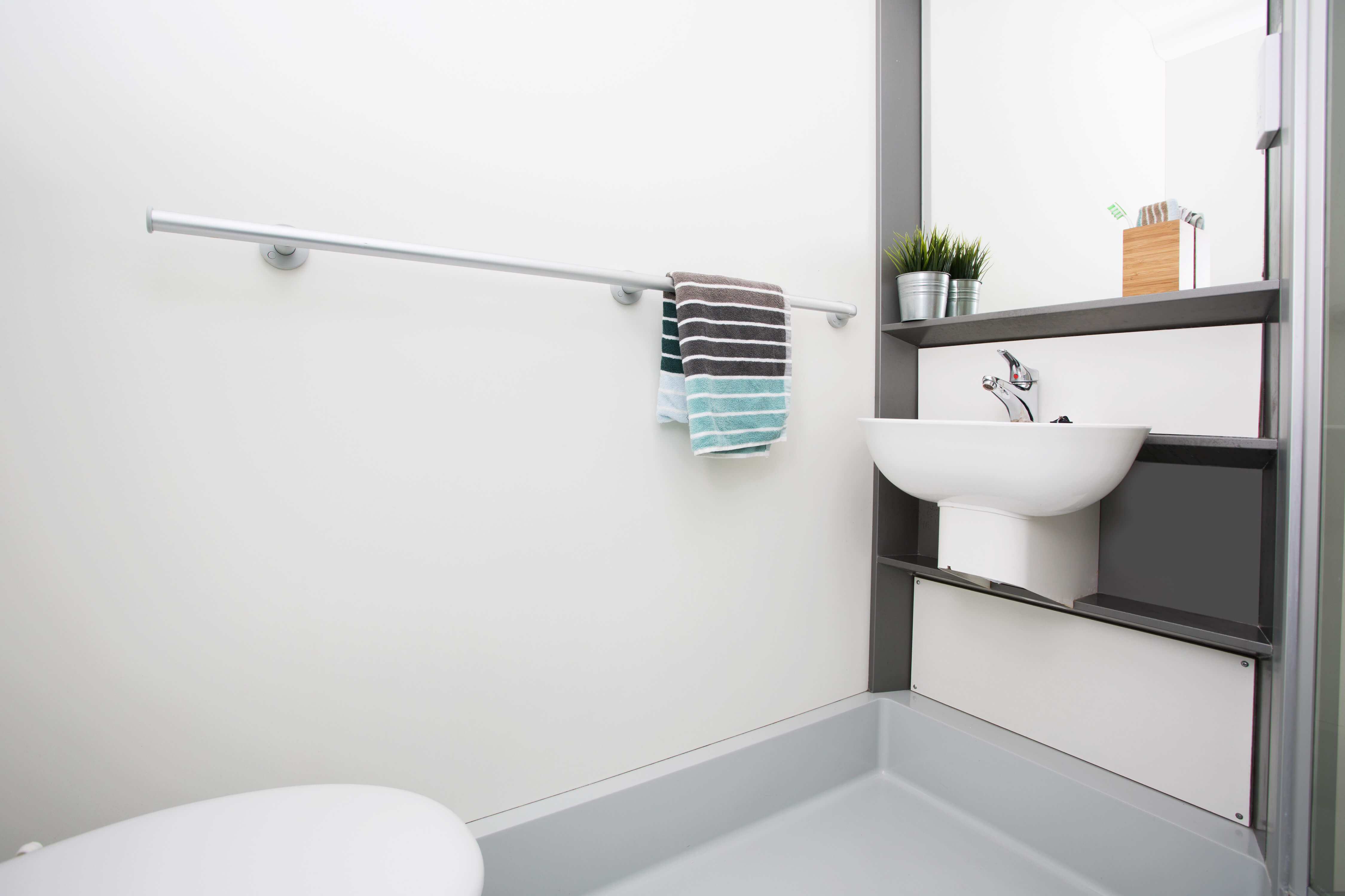 Sink and toilet in bathroom