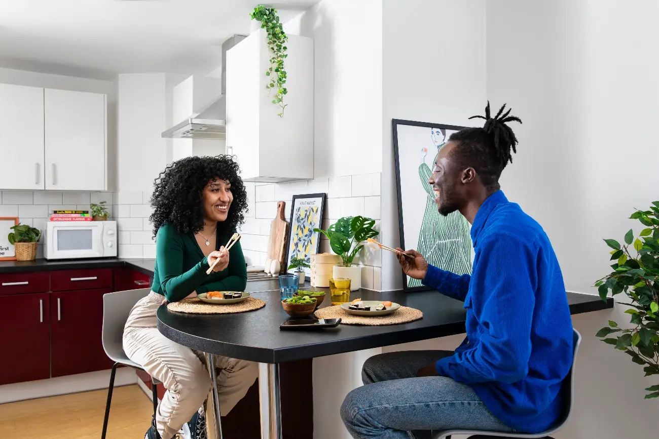 Students in a shared kitchen