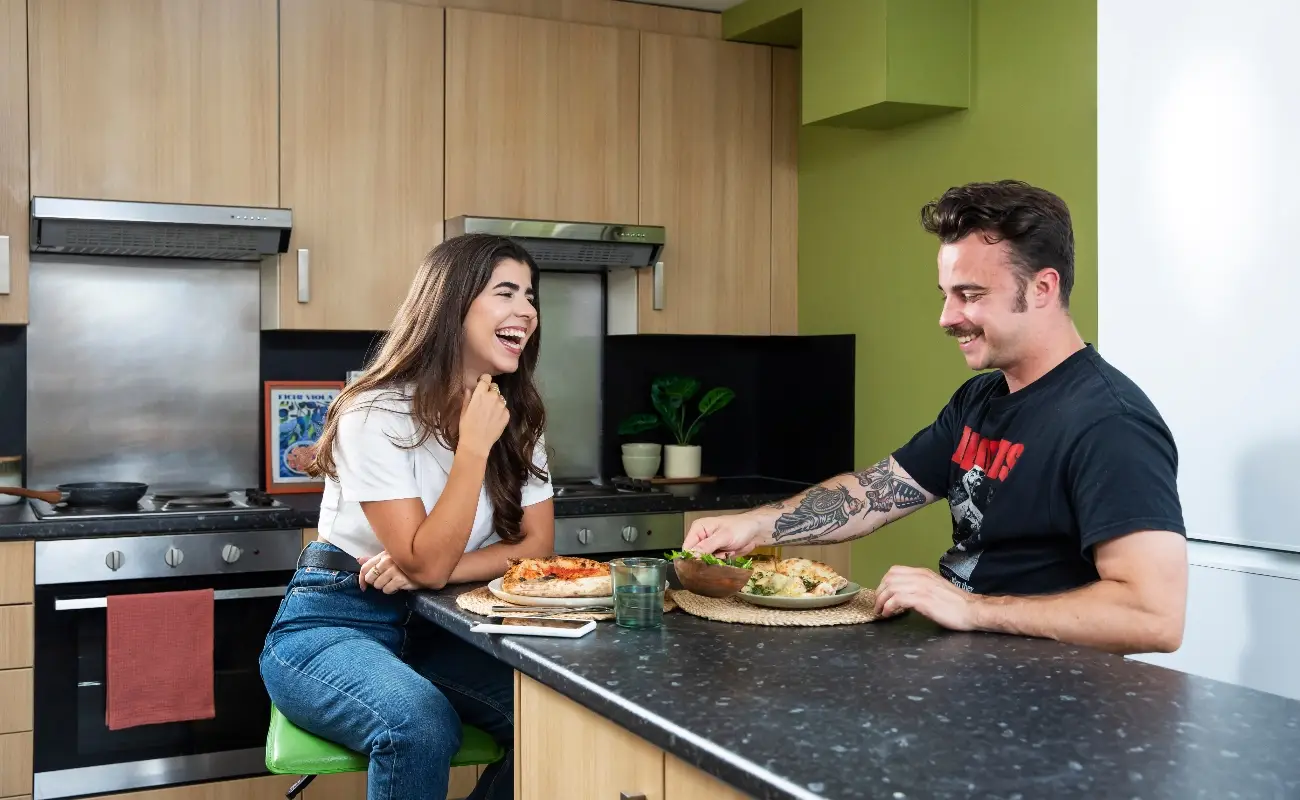 Students in a shared kitchen