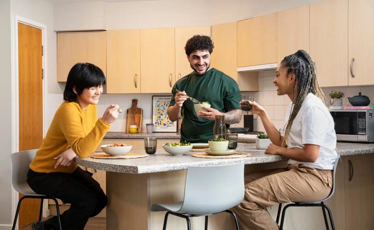 Students in a shared kitchen