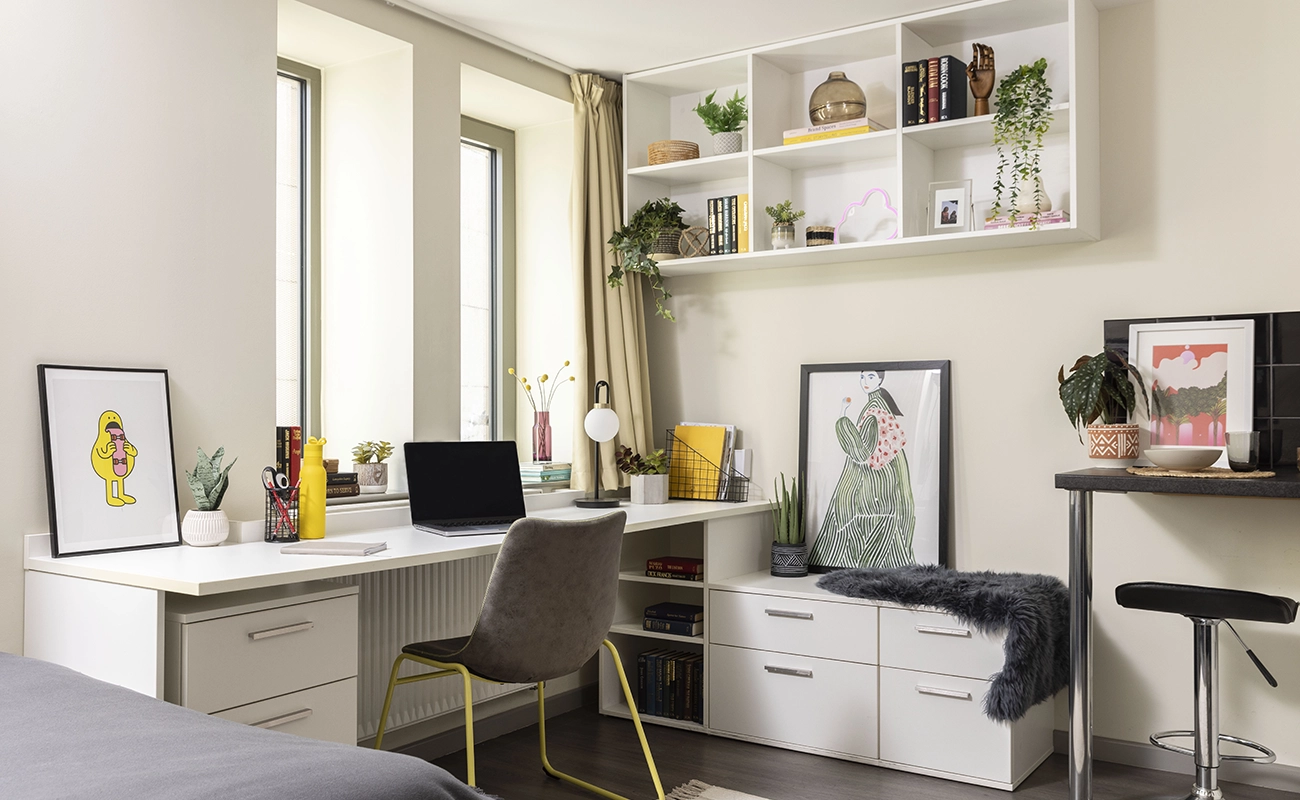 Bed and study space in a Studio