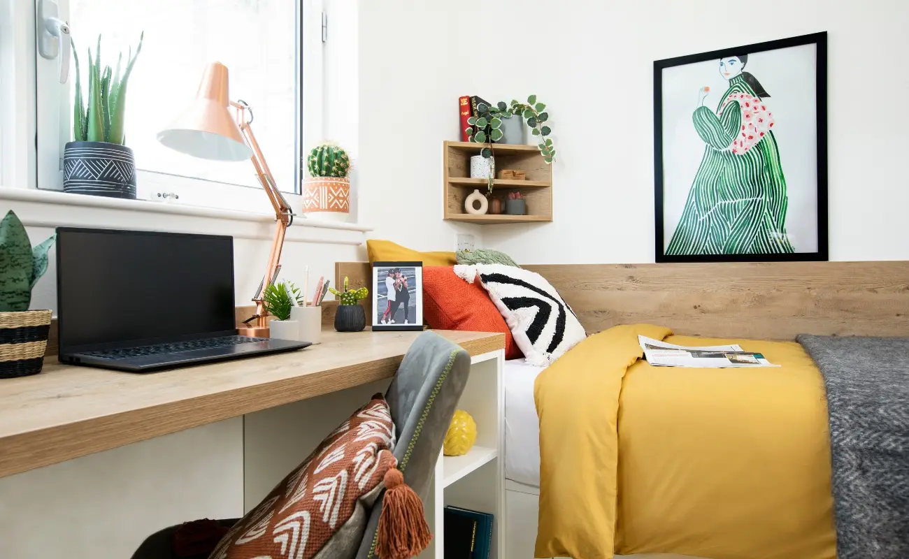 Bed and study space in a Studio Basic