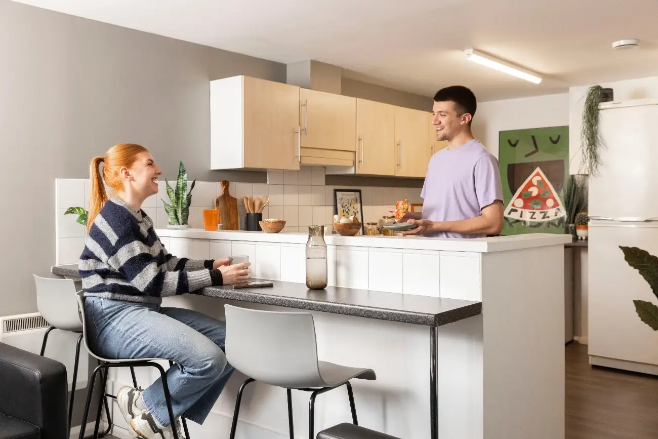 Students in a shared kitchen
