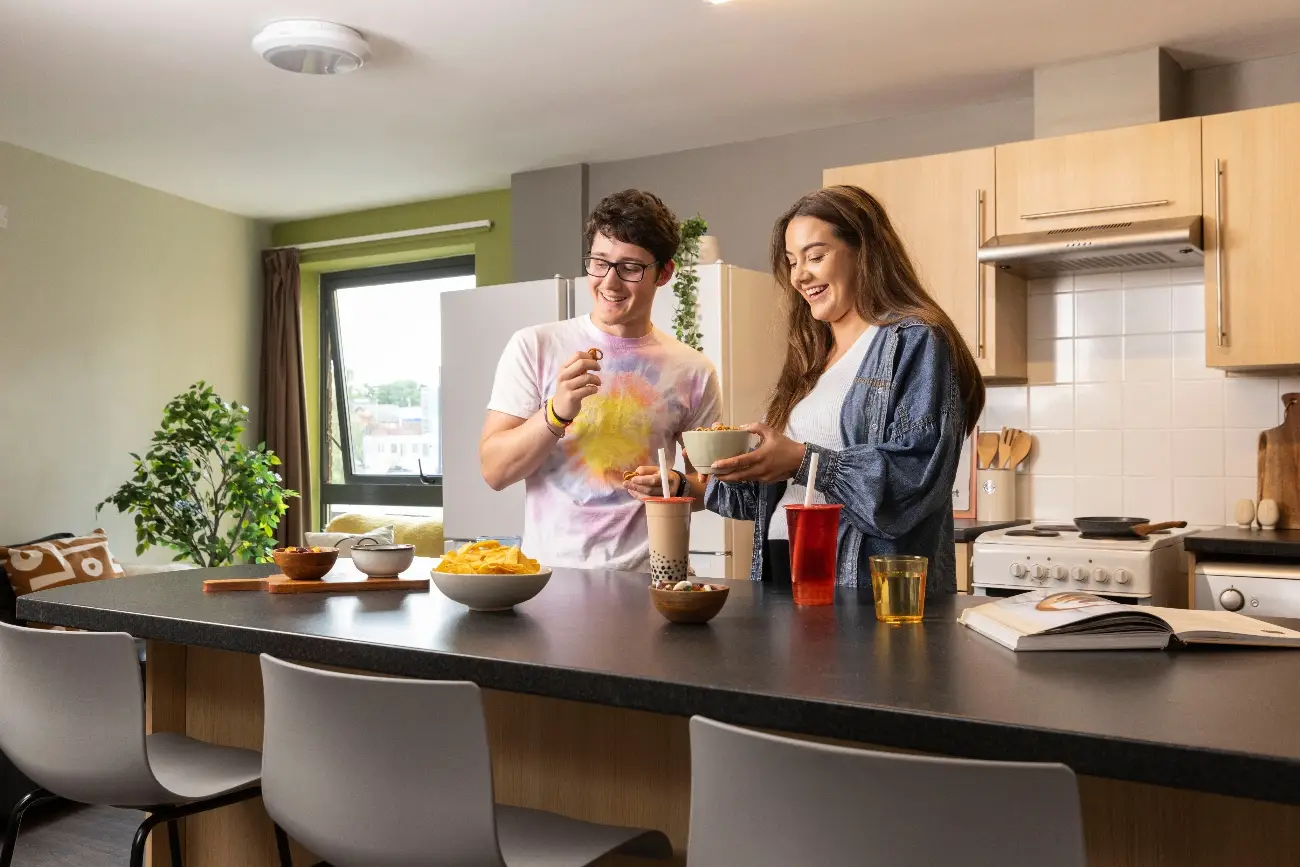 Students in a shared kitchen