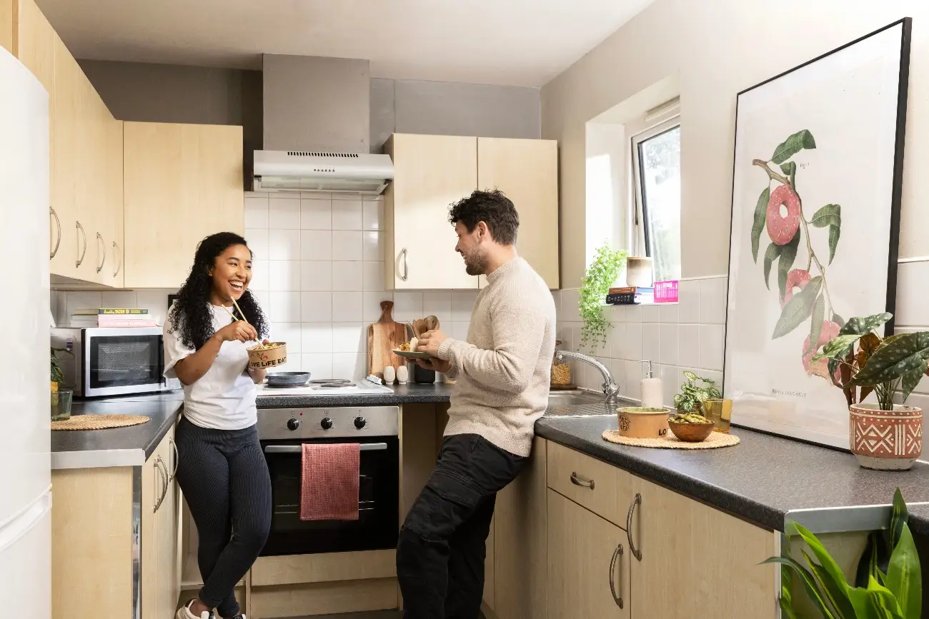Students in a shared kitchen