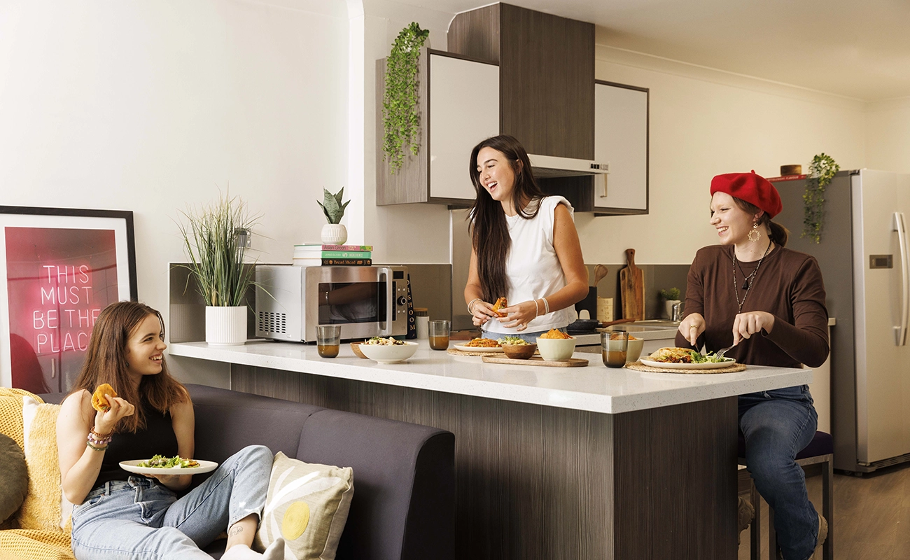 Students using a shared kitchen