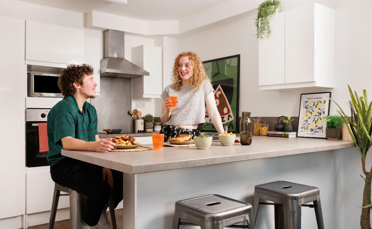 Students in a shared kitchen