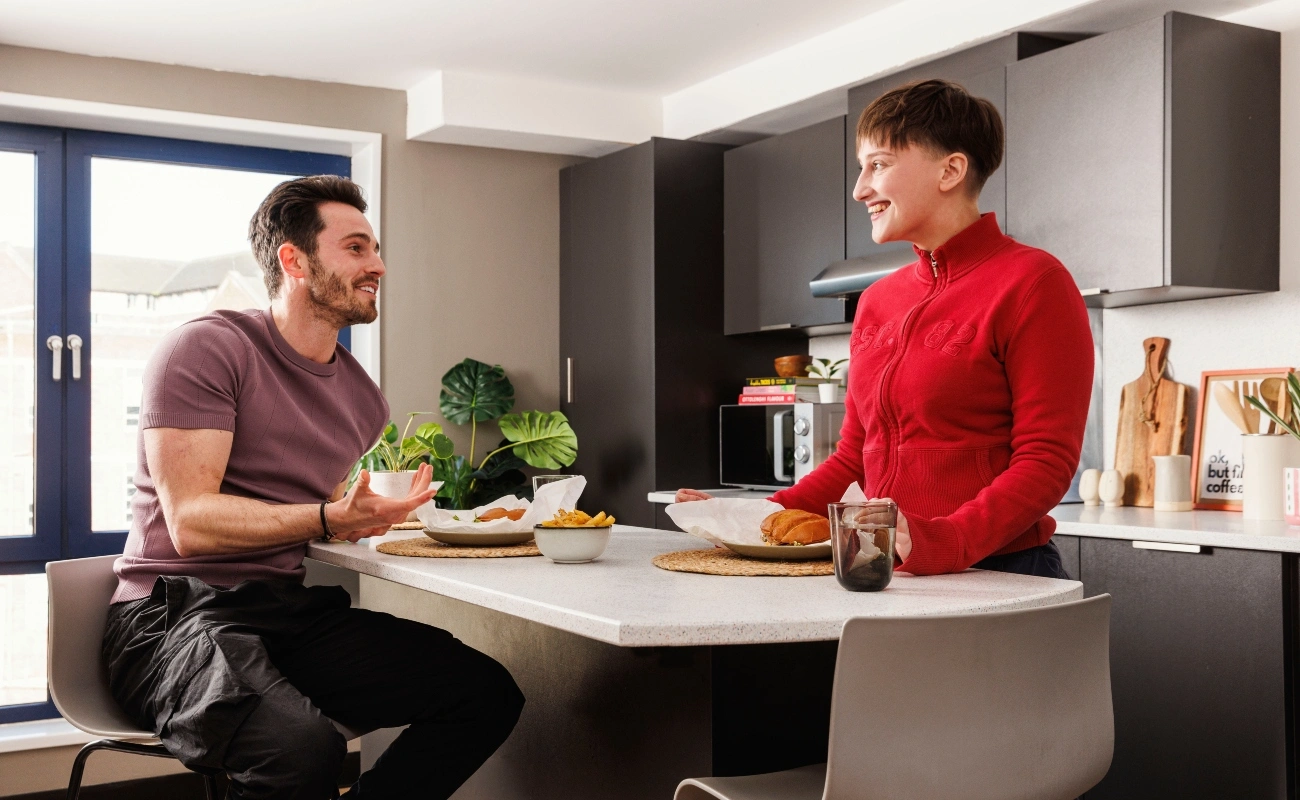 Students in a shared kitchen