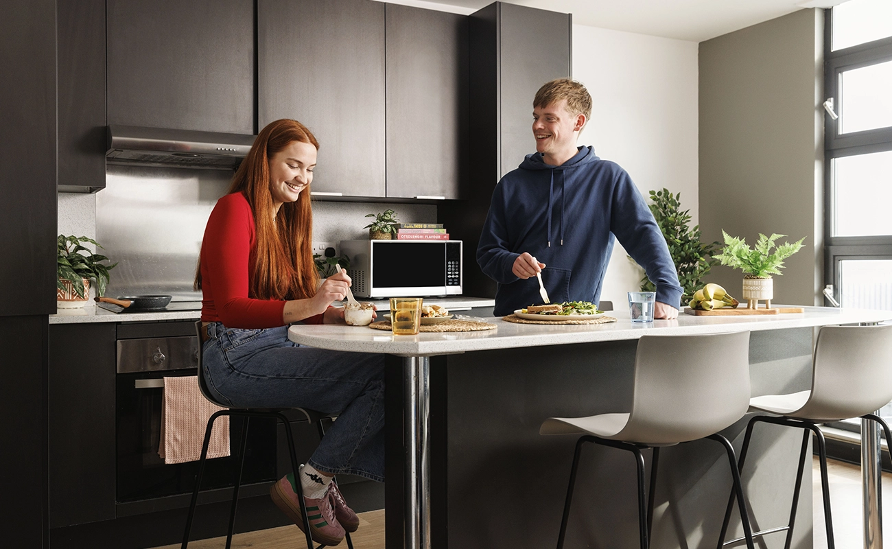 Students in the shared kitchen for ensuite rooms
