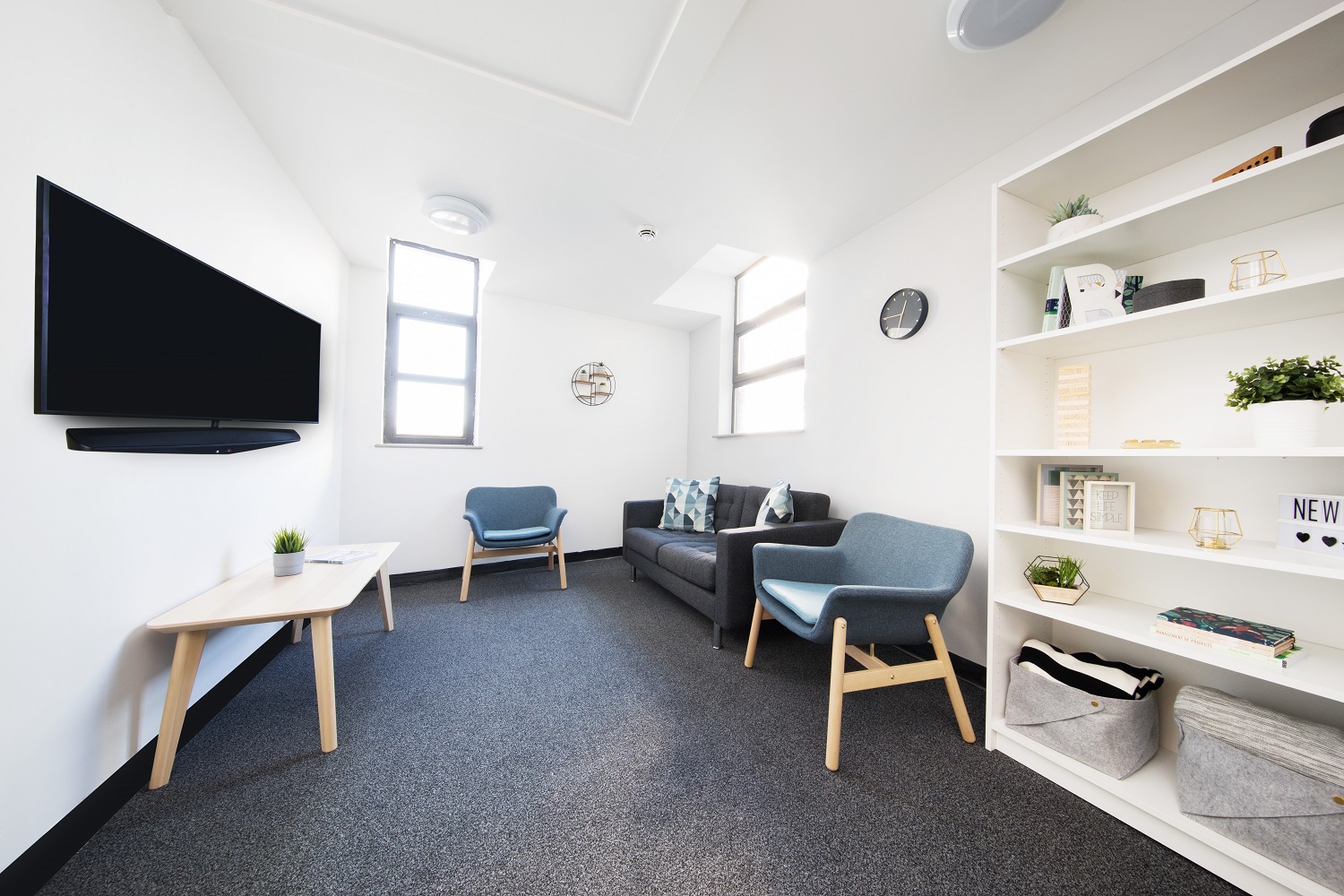 Sofa area in a shared kitchen at Magnet Court, Unite Students accommodation