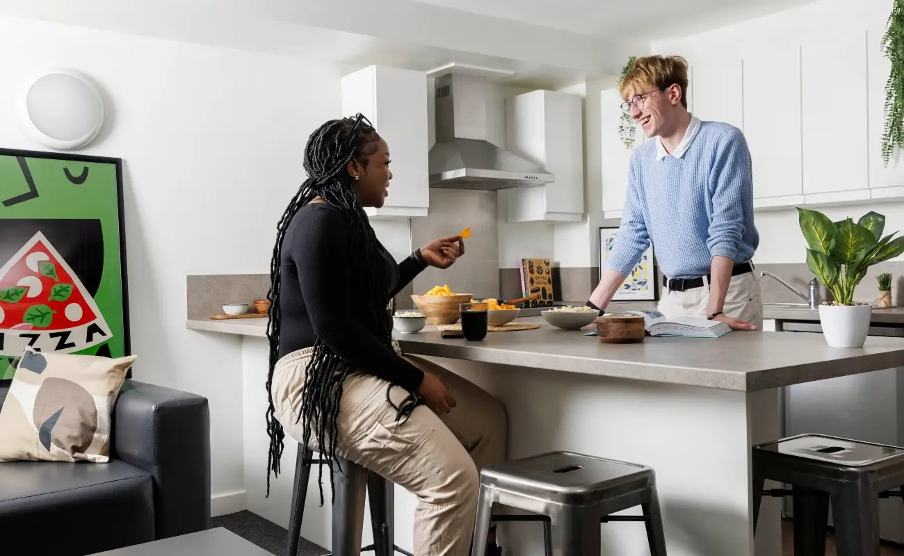 Students in a shared kitchen