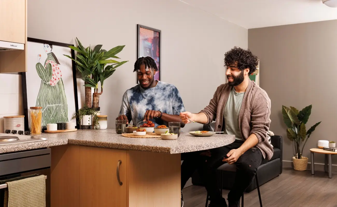 Students in a shared kitchen