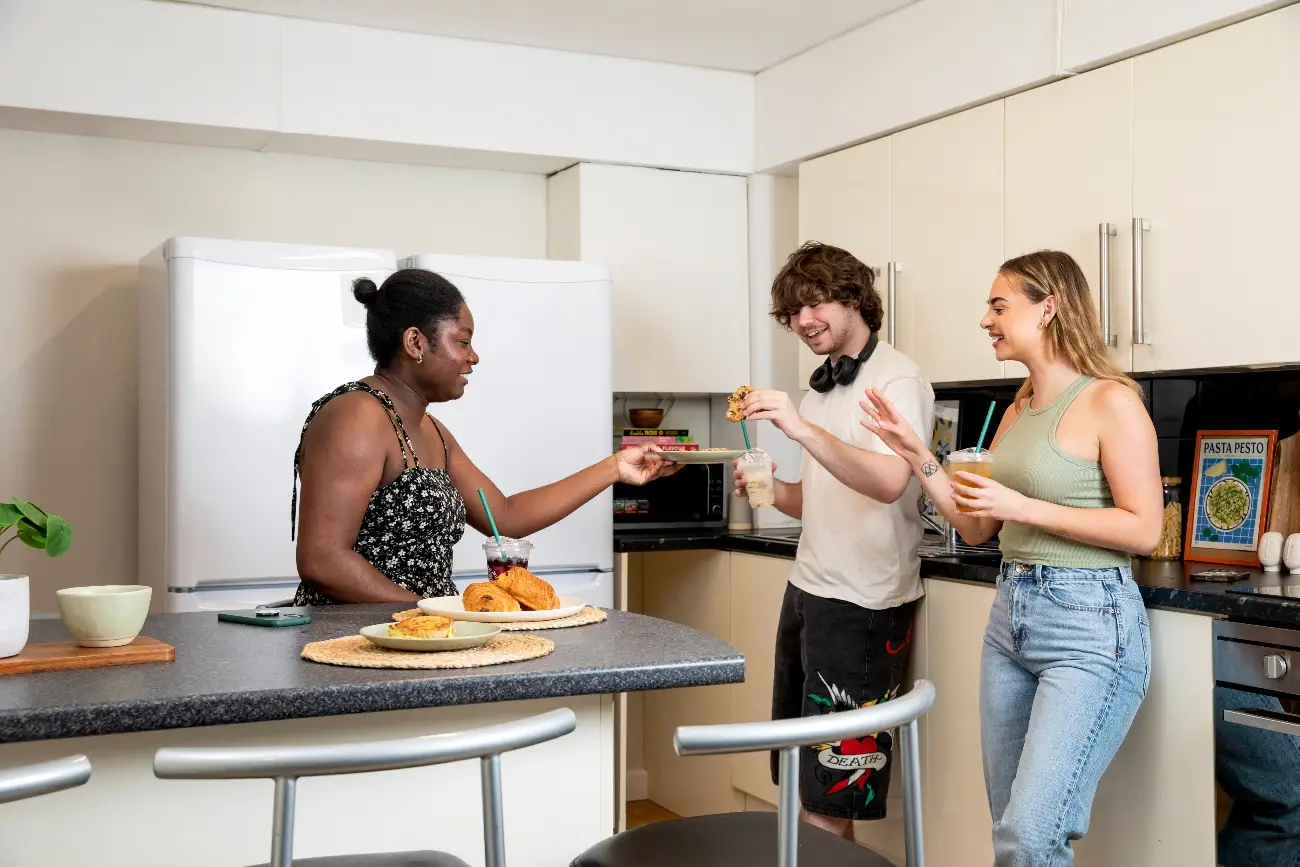 Students in a shared kitchen
