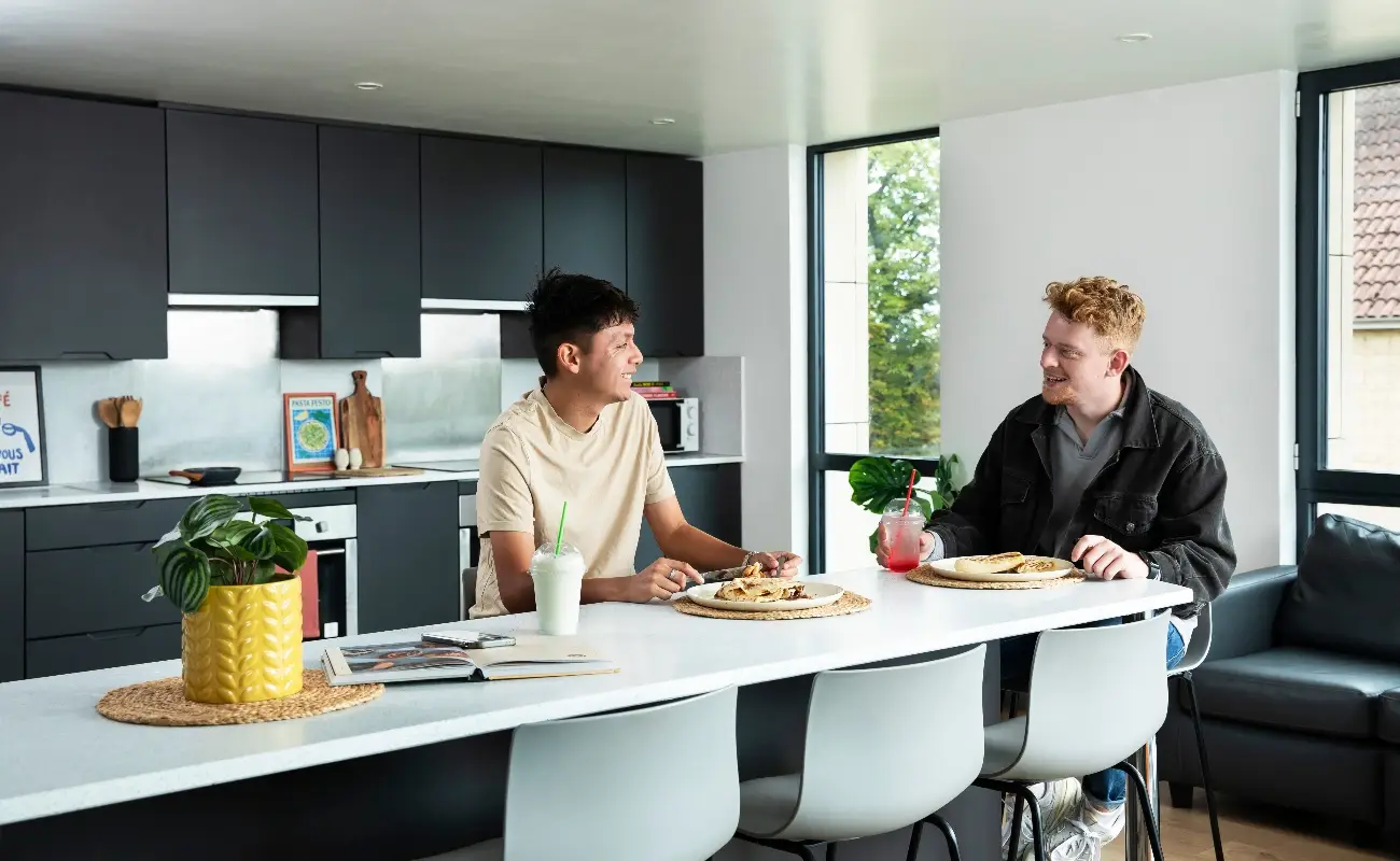 Students in a shared kitchen