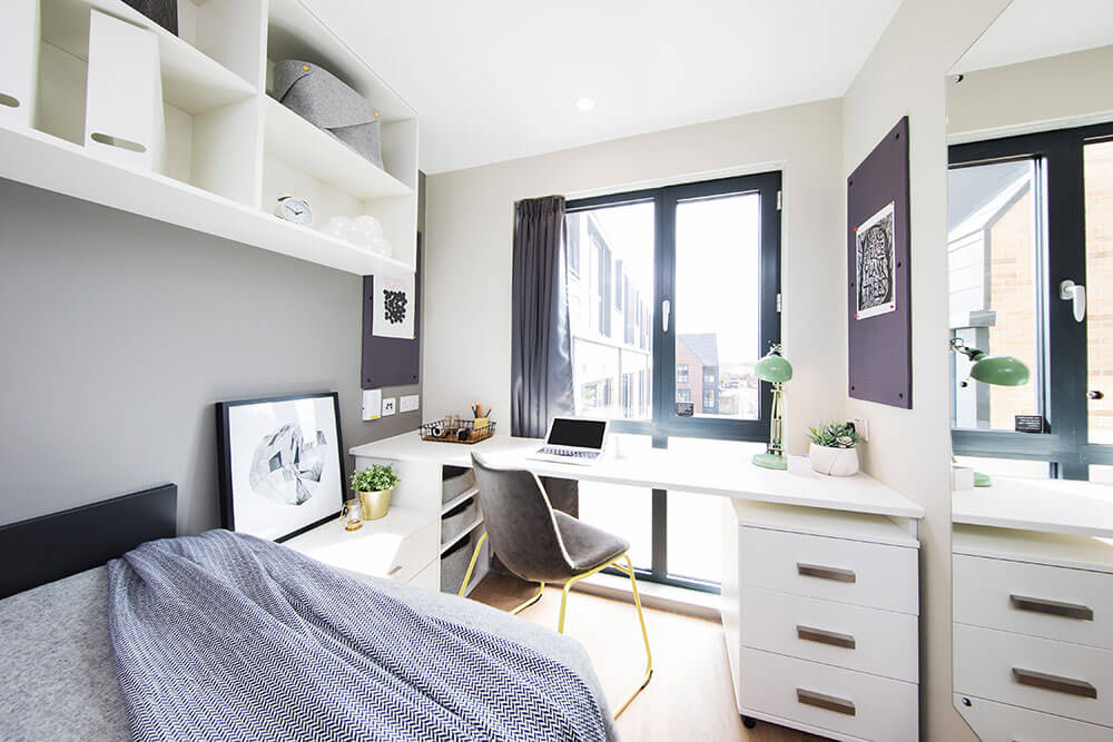 Study space in a student accommodation bedroom at Unite Students Parade Green in Oxford