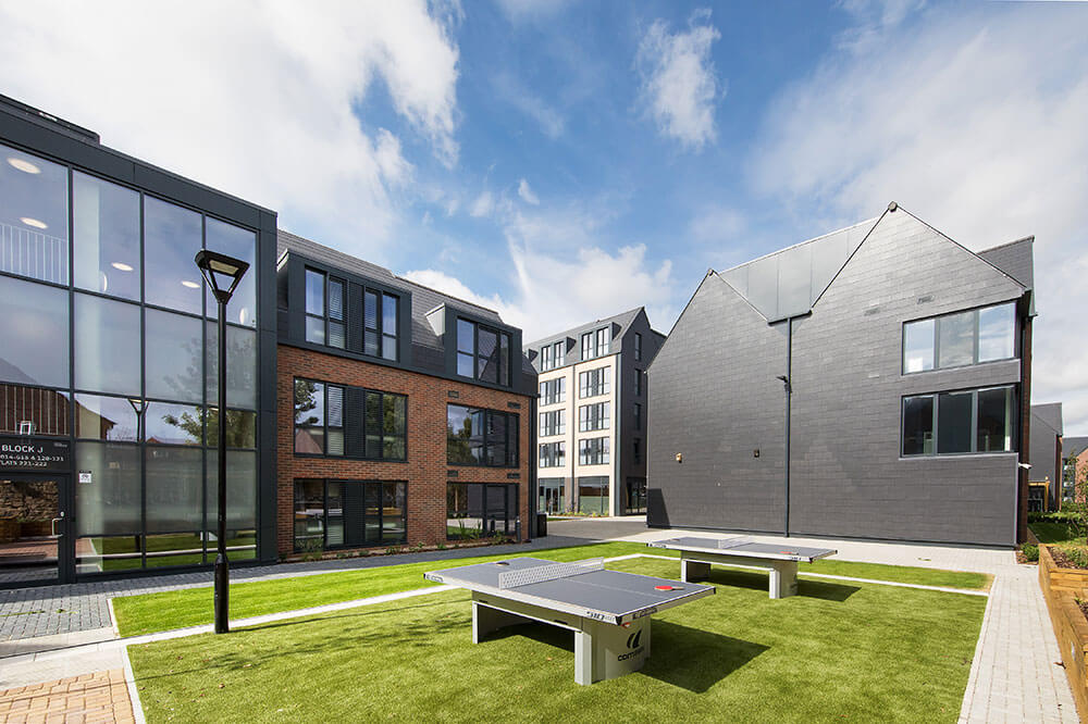 Ping Pong tables in a courtyard at Parade Green Unite Students accommodation