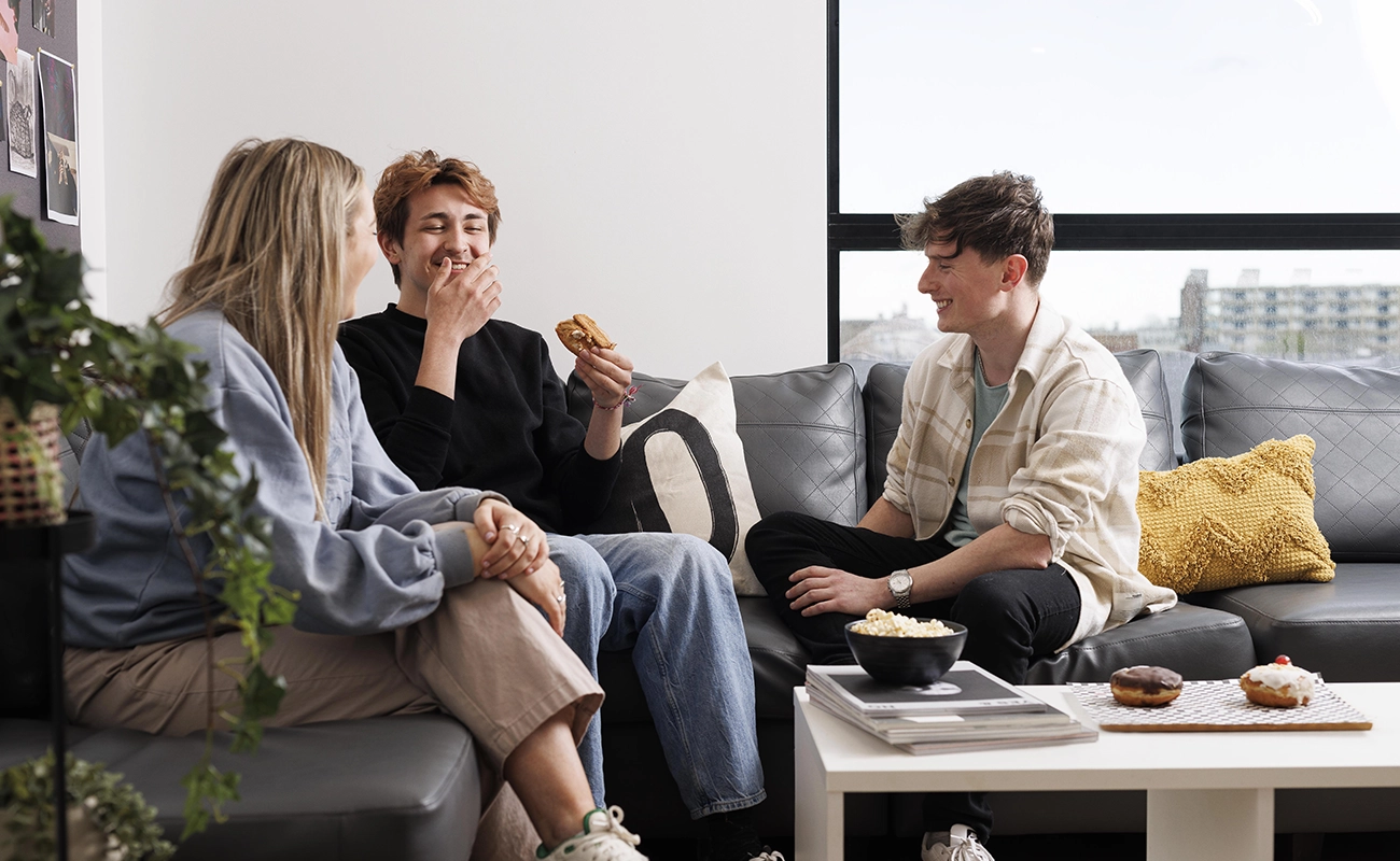 Students in the shared kitchen