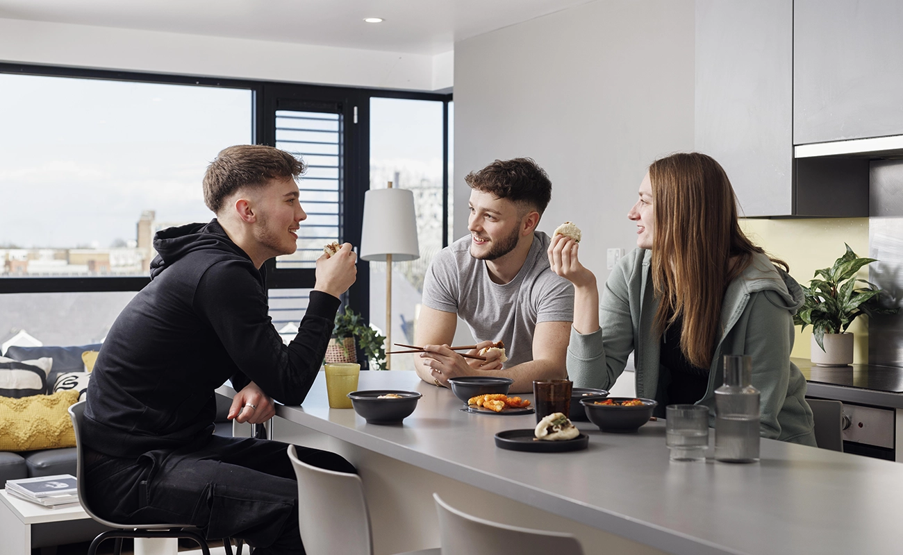 Students in the shared kitchen