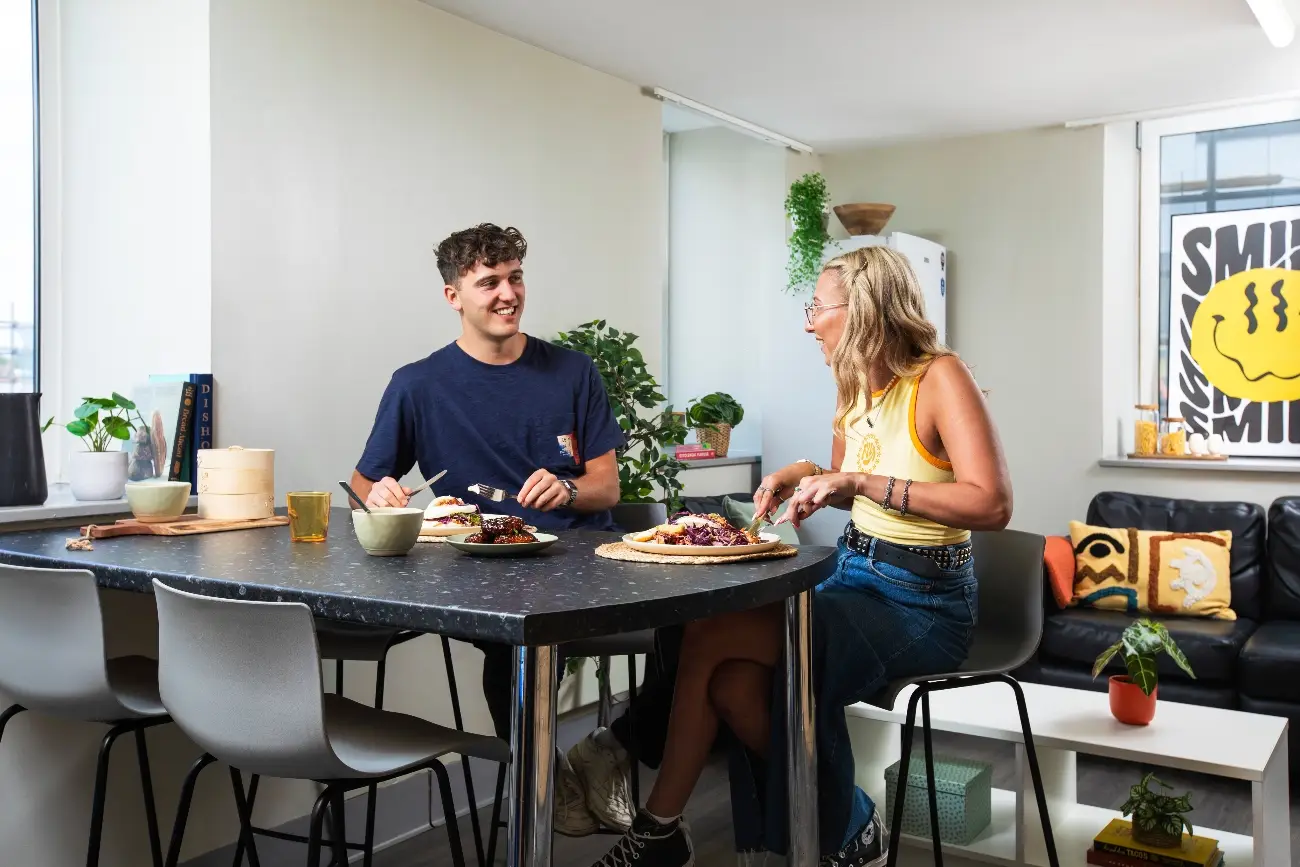 Students in a shared kitchen