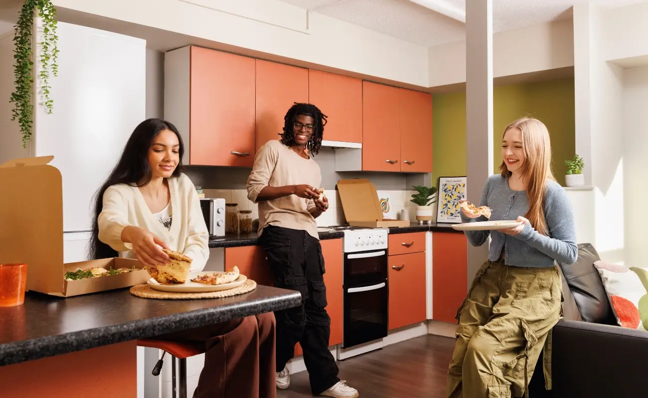 Students in a shared kitchen