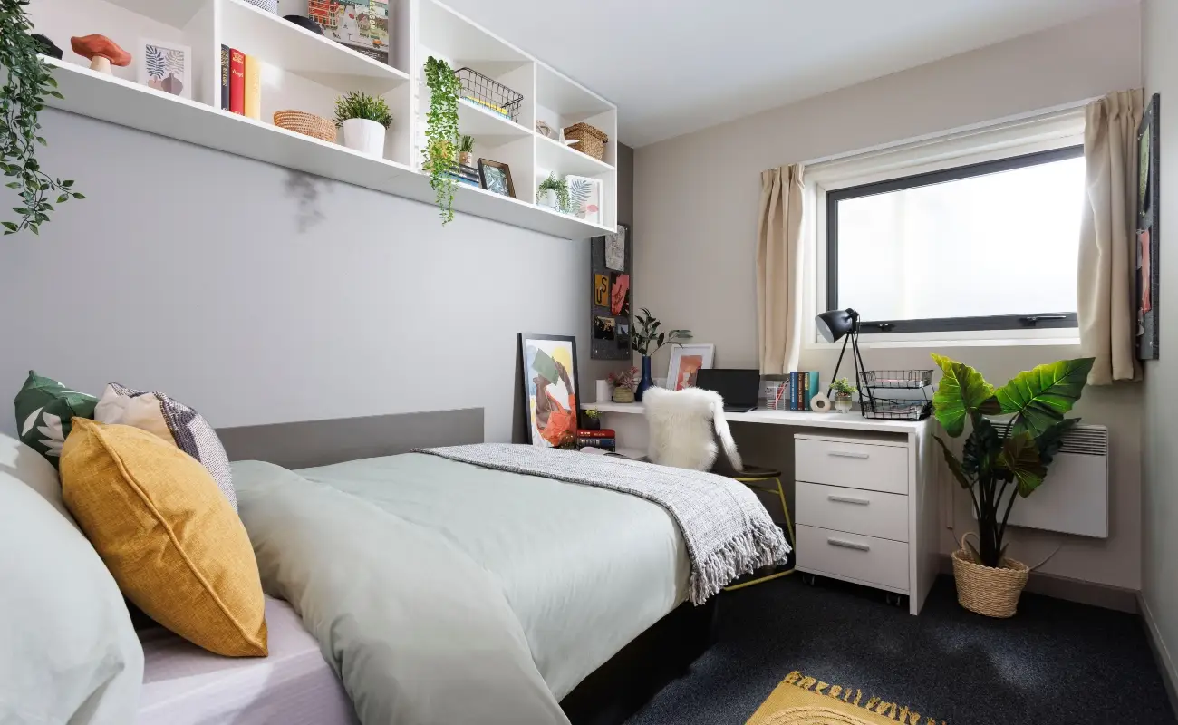 Bed and study space in an Ensuite Basic