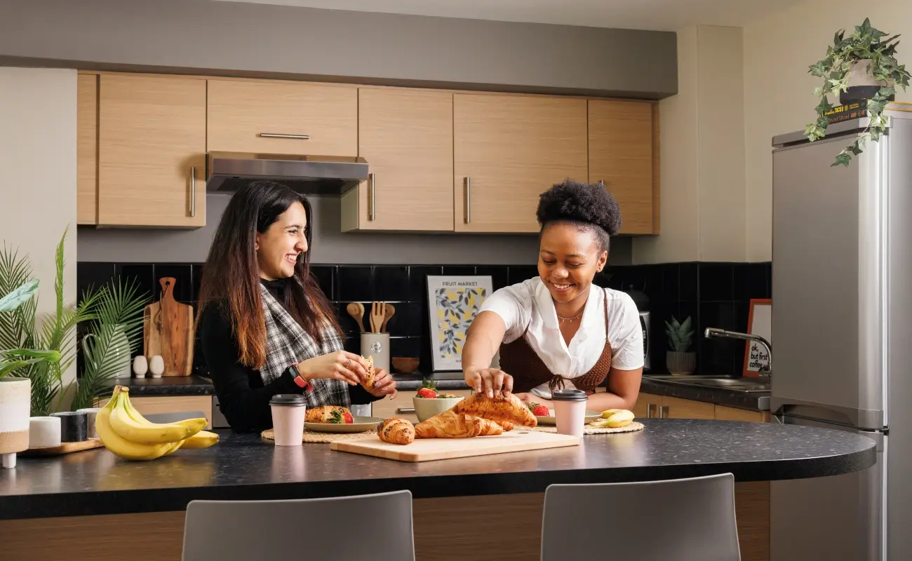 Students in a shared kitchen