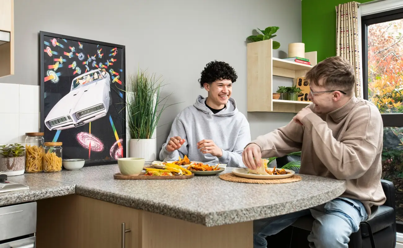 Students in a shared kitchen