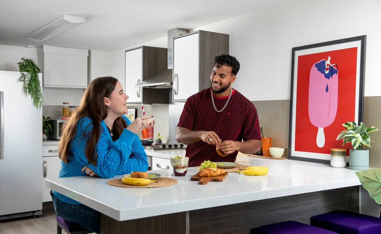 Students in a shared kitchen